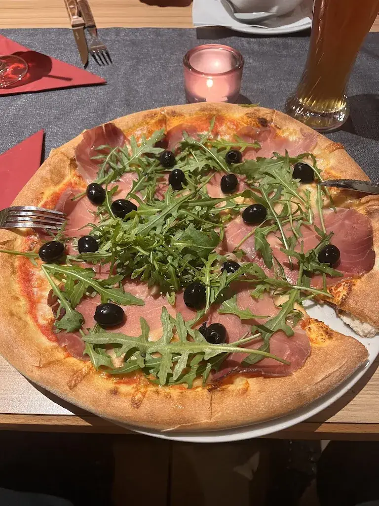 Krzysztof Karpinski_Pizzeria Cascata_Krimml_avis