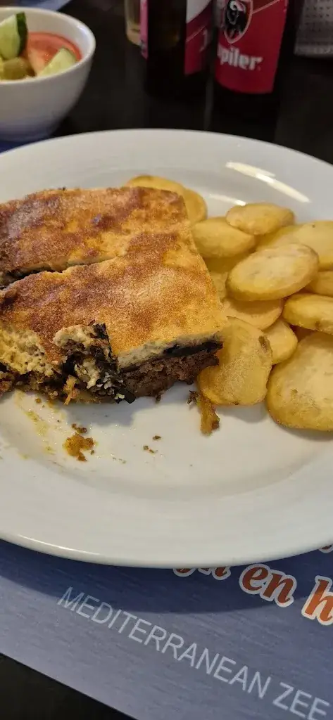 Łukasz Zd_Taverne Korfu_Kapellen_recensione