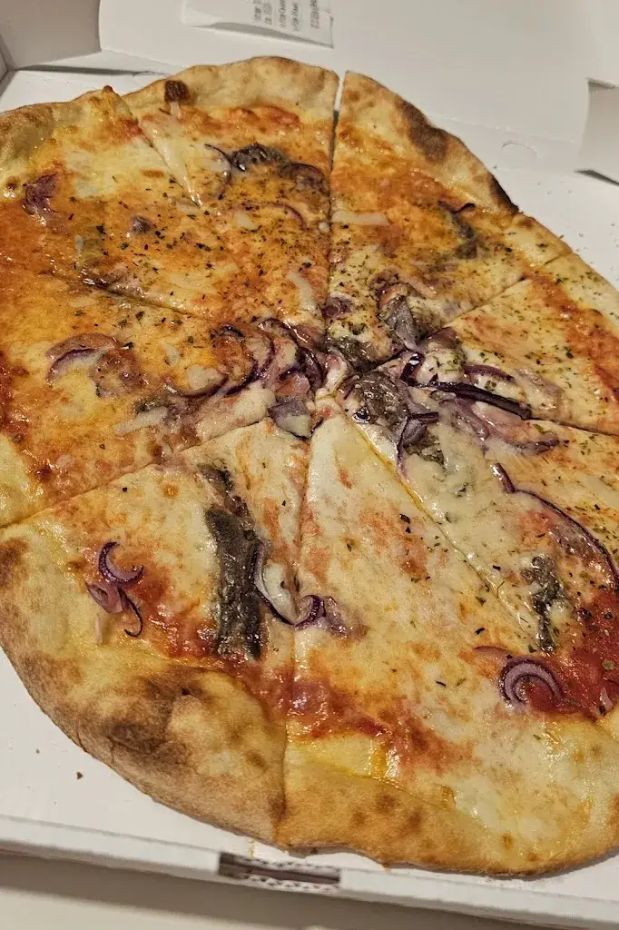 Celine Vancoppenolle_La Perla pizzeria_Dentergem_review