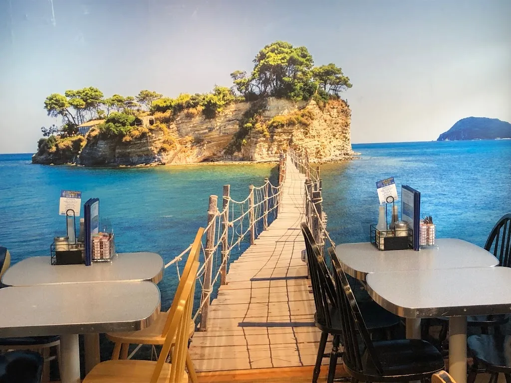 CAPTAINS GRILL DINER INC. restaurante en Amigo Beach