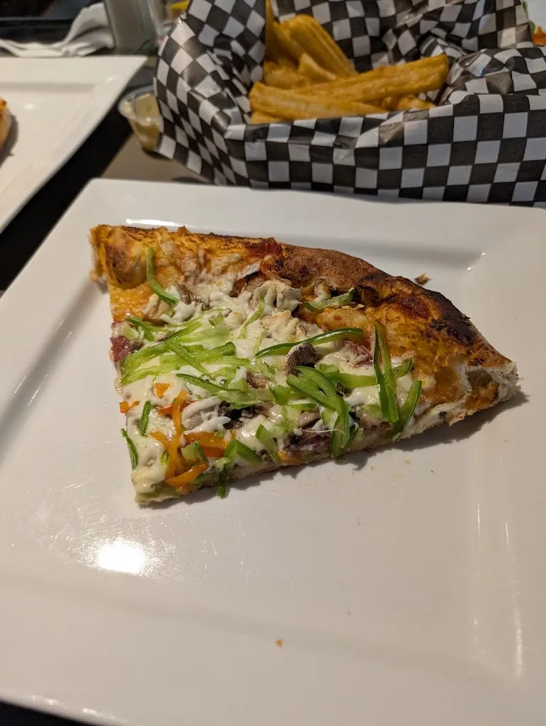 Michael Ryan_O P'tit Bar Resto Pizza four a Bois_Cabano_review