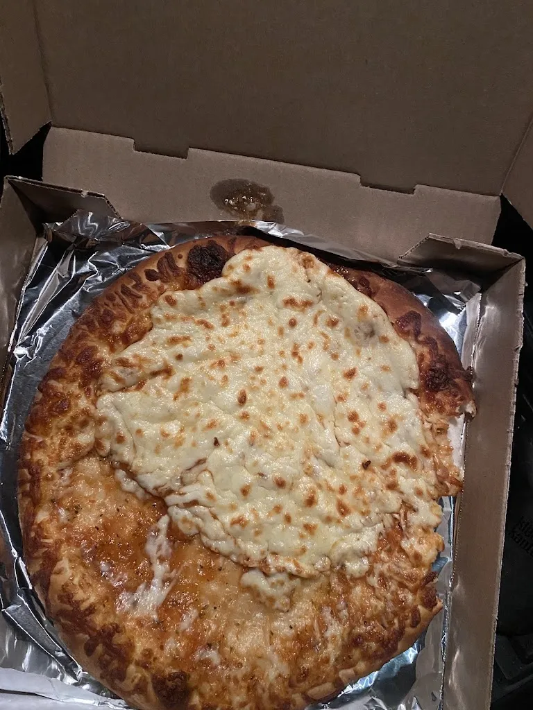 Biniam Mekuria_Bellissimo Pizza_Sainte-Anne-des-Plaines_reseña