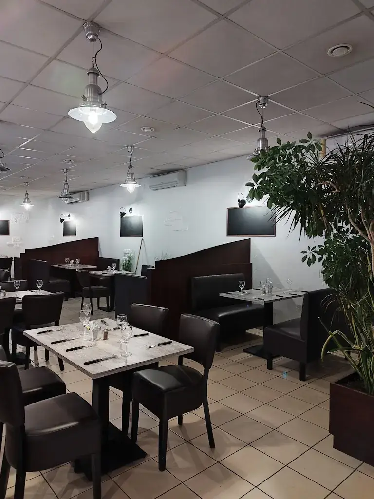 Au Petit Four Pizzeria restaurant in Warmeriville