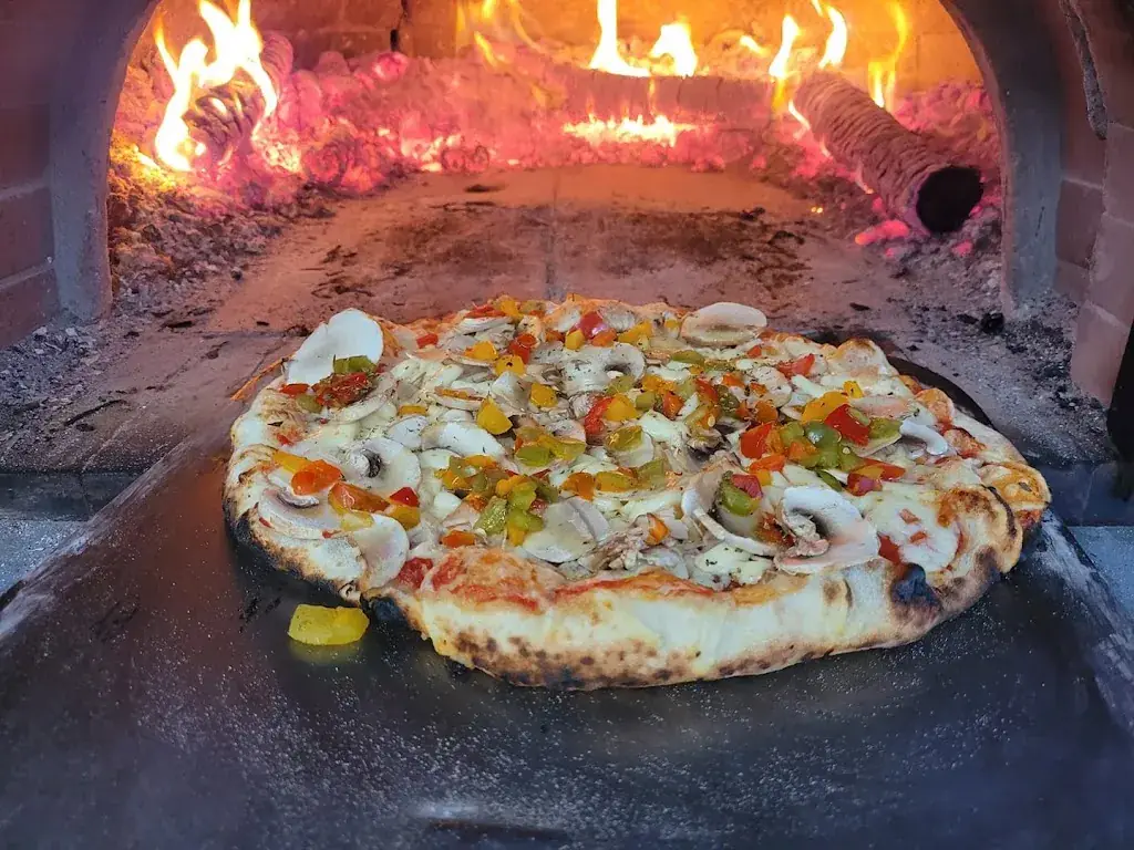 Benito's pizzacotta Restaurant in Masny