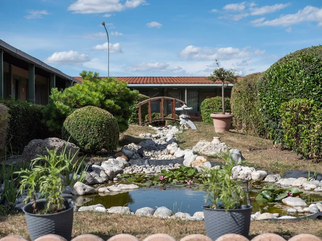 Hôtel Restaurant Les Jardins d'Epône restaurant in Épône