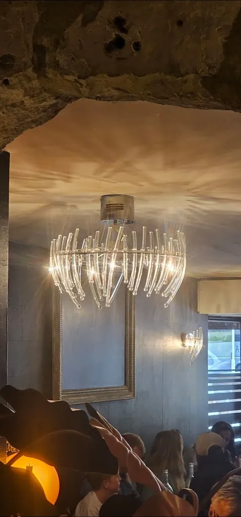 Eileen L. Smith_El Olivo_Caen_review