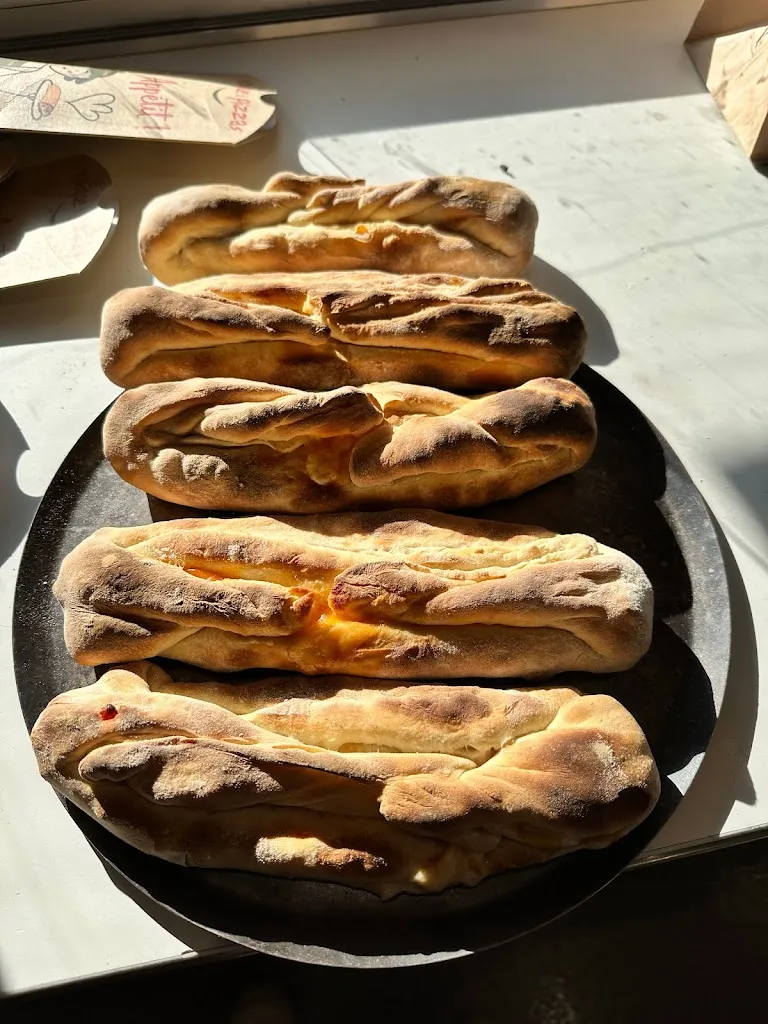 Le kiosque à pizzas_Teil_slider_image_2