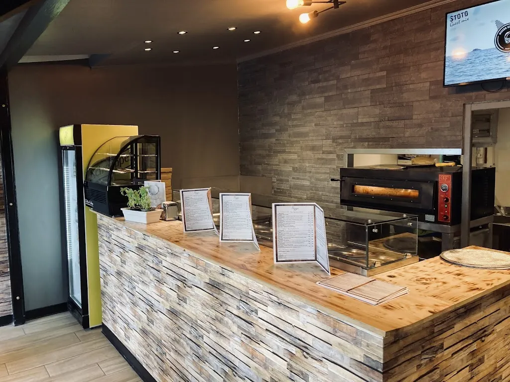 L'Atelier Hizkiya Pizzeria restaurant in Rodilhan