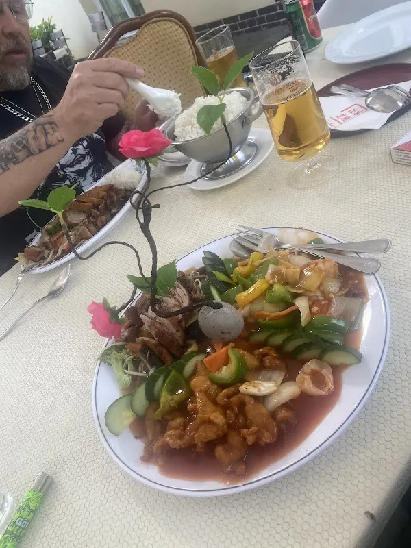 József Berki_Peking-Garten_Zossen_review