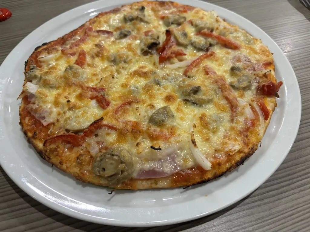 Juanjo López_Sevila Pizzeria_Bentheim_review