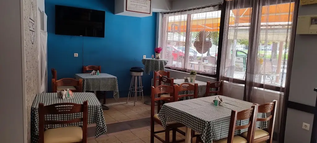 Ο γύρος της πλατείας Restaurant in Kolindrós