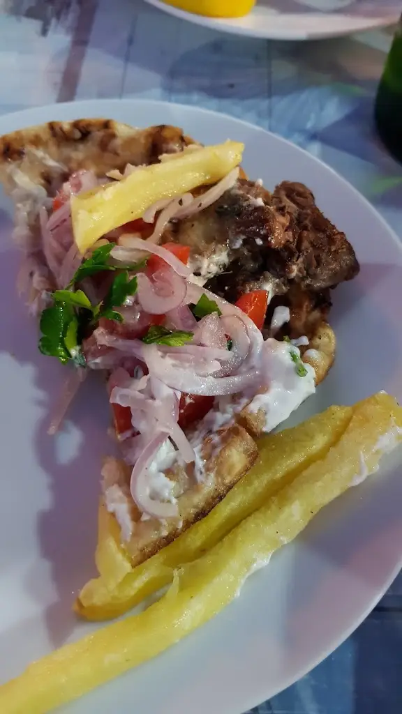 Nicholas Flood_Dionysis_Áyioi Apóstoloi_Bewertung