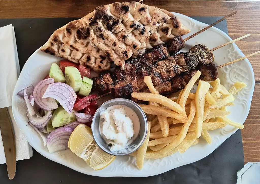 Piotr Turski_Στην πλατεία_Lefkímmi_Bewertung