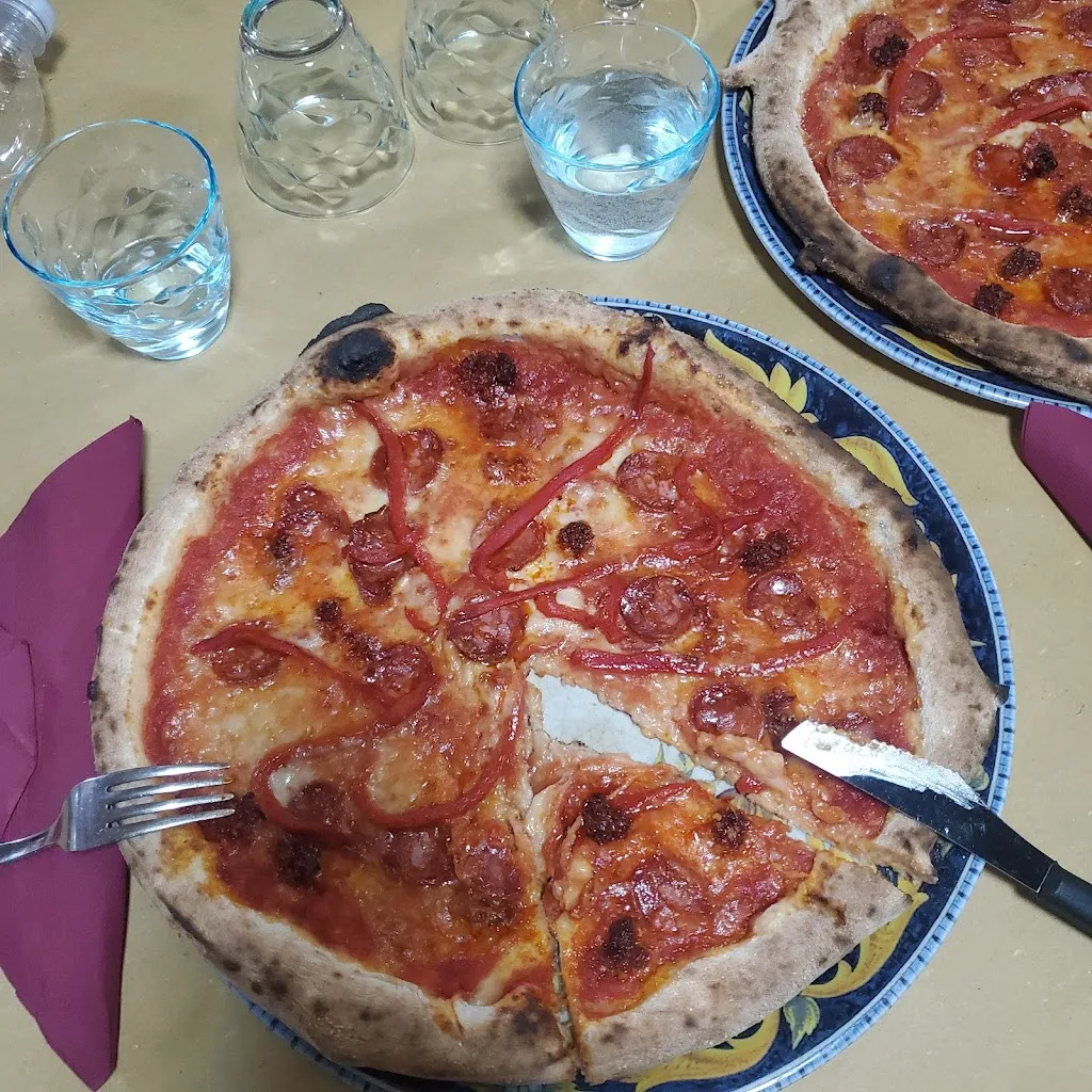 R GONZALEZ_Bar Pizzeria LA PANTERA ROSA_Firmo_recensione