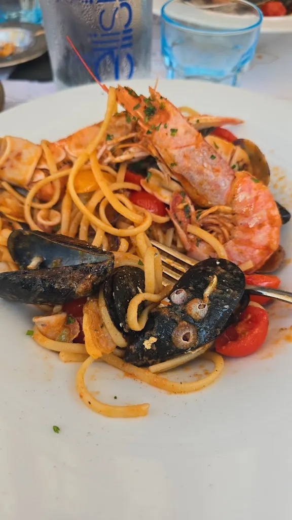 Juan Carlos_Stella Marina Beach bar ristorante spiaggia privata_Stella_review
