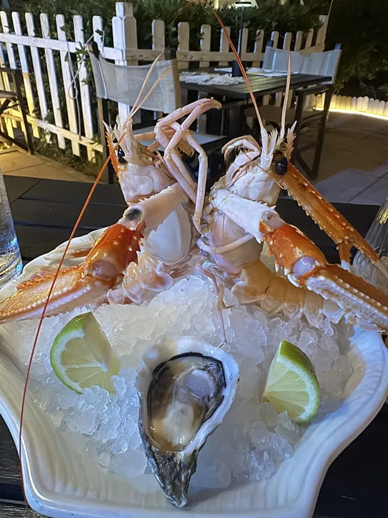 Garry Dela Luna_L'Ostrica Pazza_Acilia-Castel Fusano-Ostia Antica_recensione