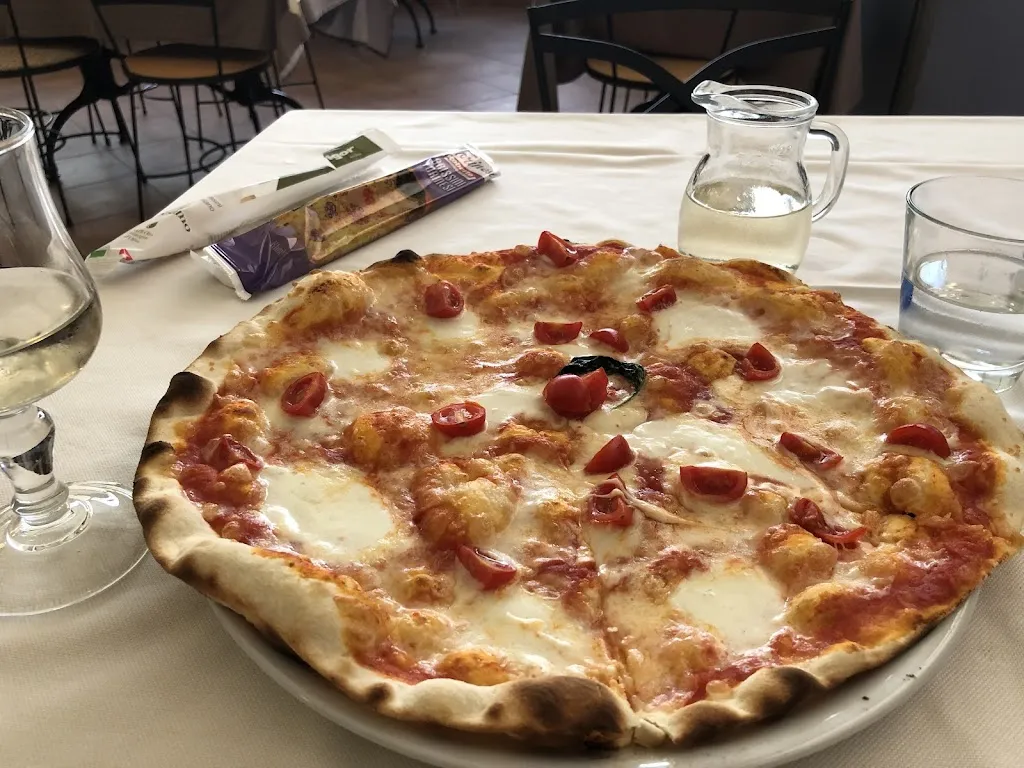 Dmitrii Kostiunin_Trattoria Pizzeria Timoline 