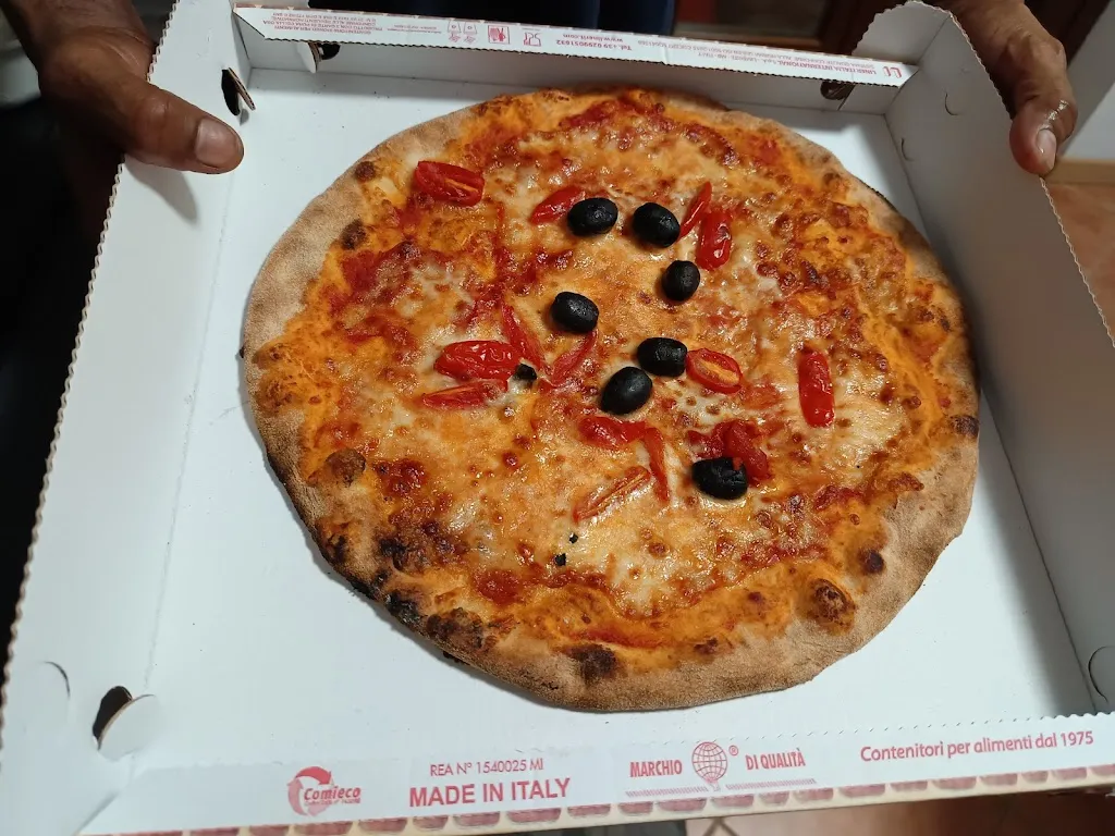 Pizzeria la casetta restaurant in Nuvolento