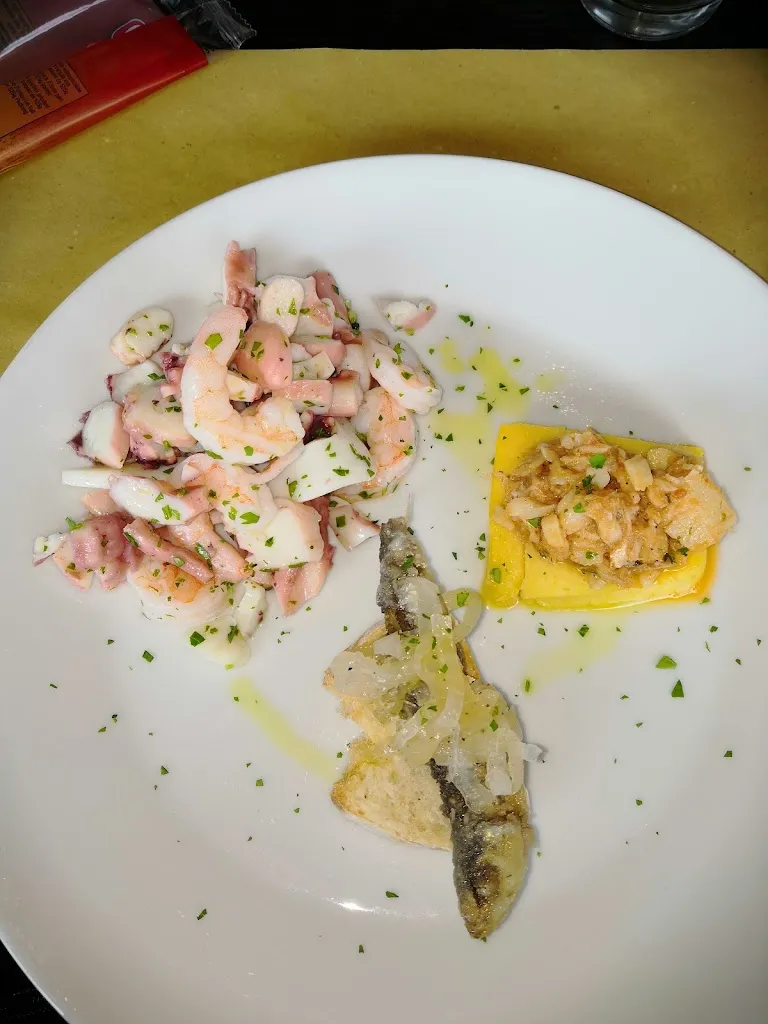 Paolo Ziosi_Casa Rizzoli - Pescheria Gastronomia - Street Food_Sustinente_review