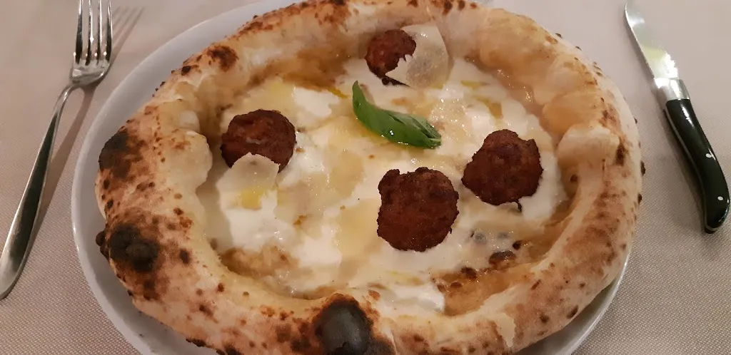 Marco V_Karalis_Uboldo_review