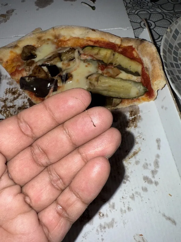 Param Mahi_Osteria Pizzeria Zeus_Genola_review