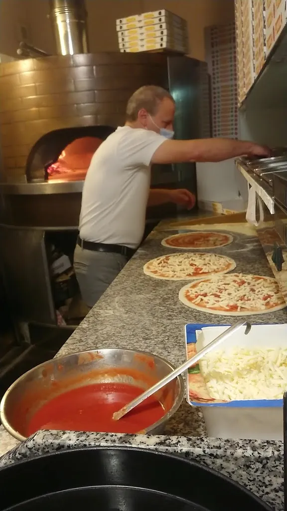 Ristorante Pizzeria Cala Azzurra_Granozzo con Monticello_slider_image_2