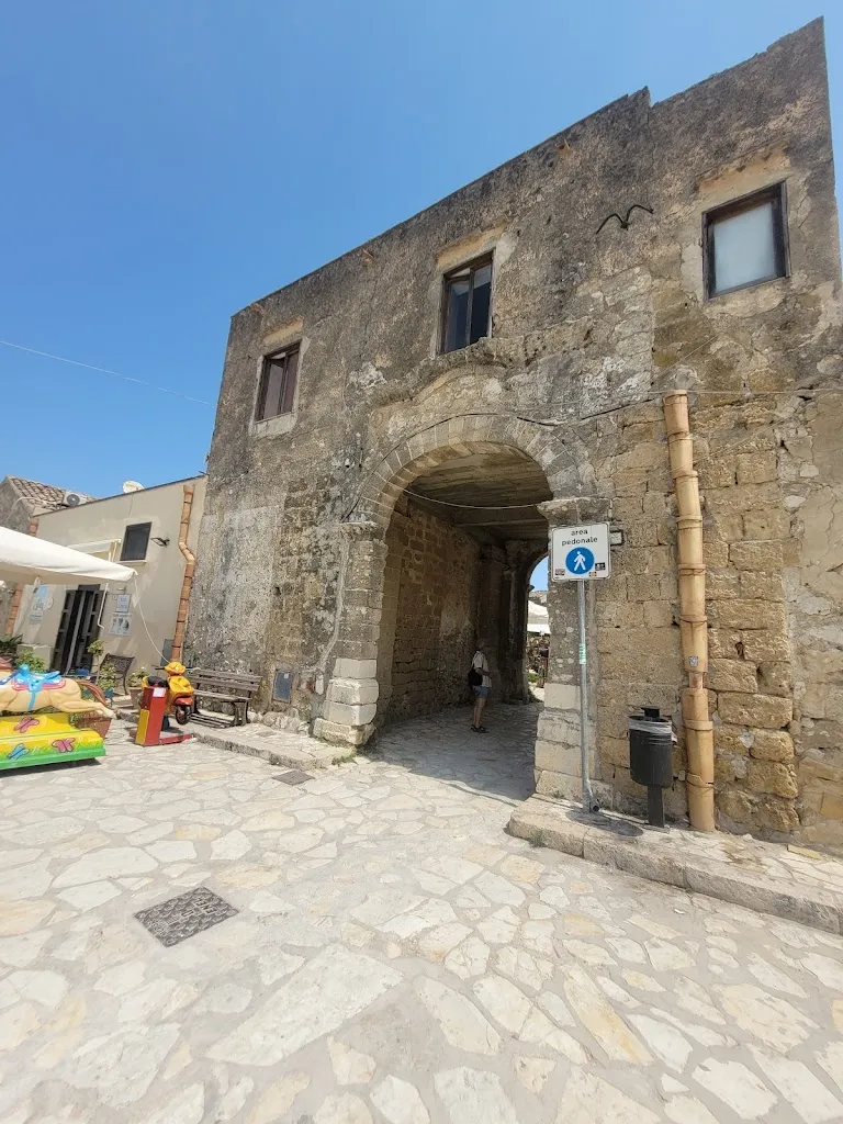 Fortified courtyard restaurant in Scopello