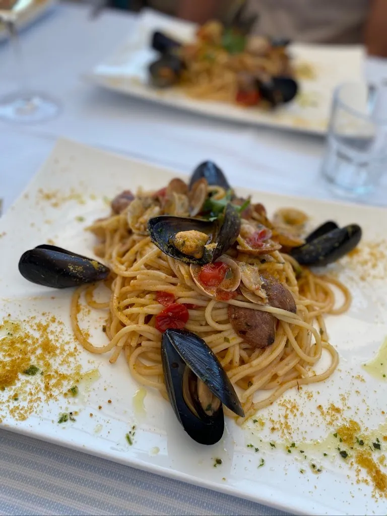 Monica Tatiana Roxas_Giropizza Triku Beach_Golfo Aranci_review