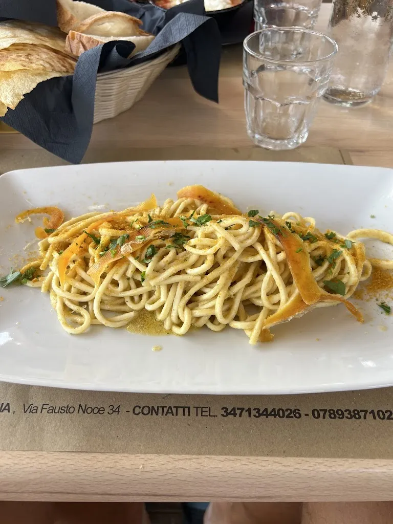 Aksel Helbek_Giropizza Triku Beach_Golfo Aranci_review