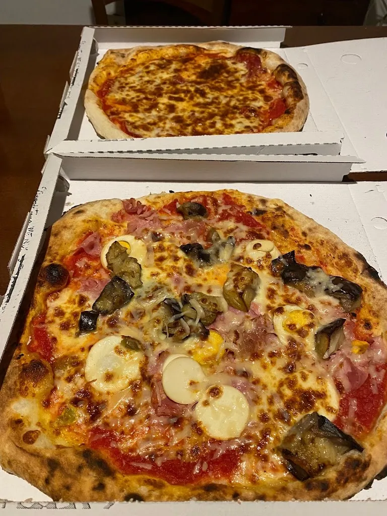 Ewa Łukaszewska_L'angolo della Pizza_Villasmundo_review