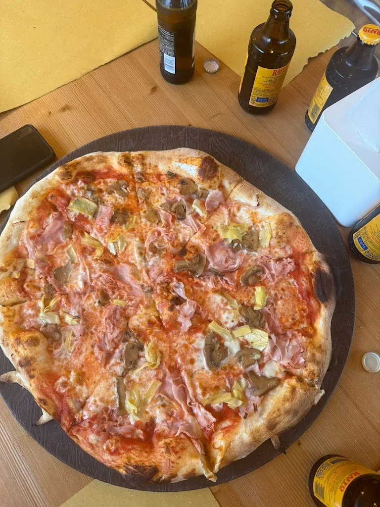 Elmundo Delawega_Pizza shop_Carano_review