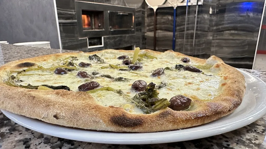 Pizzeria Canguro Nero 1981_Boschi Sant'Anna_slider_image_2