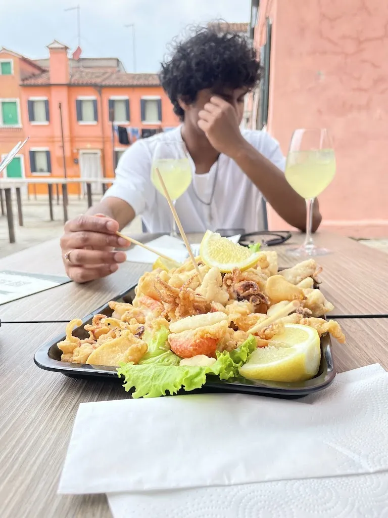 Lucian Ramnarase_AI BANKY Specialità locali di pesce_Burano_review