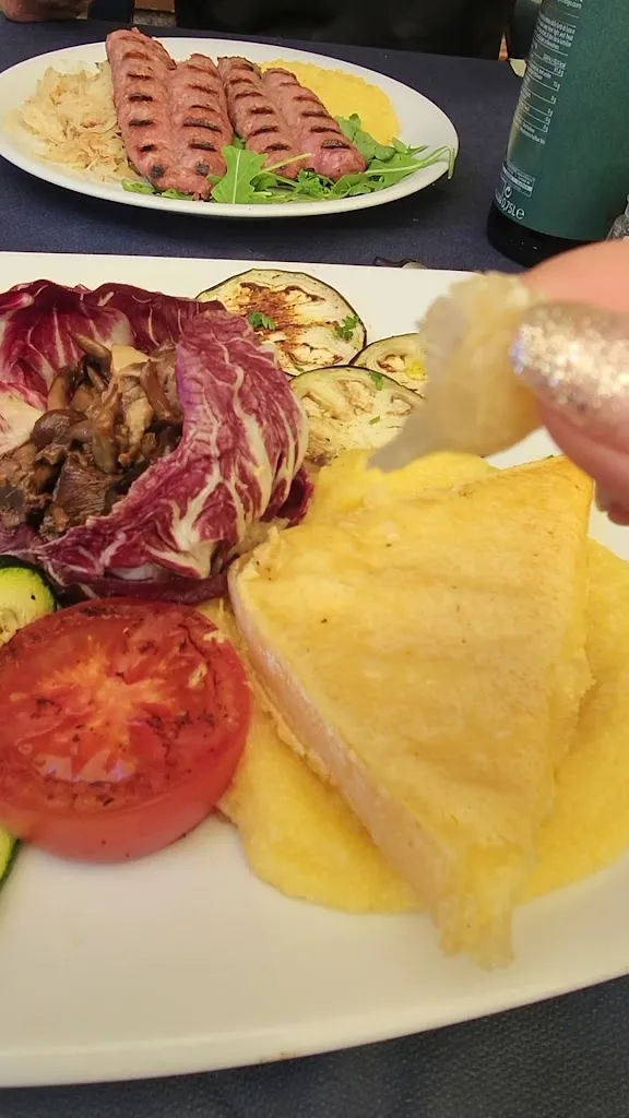 Trinh Pham _Birreria & Trattoria Vienna_Cortina d'Ampezzo_reseña