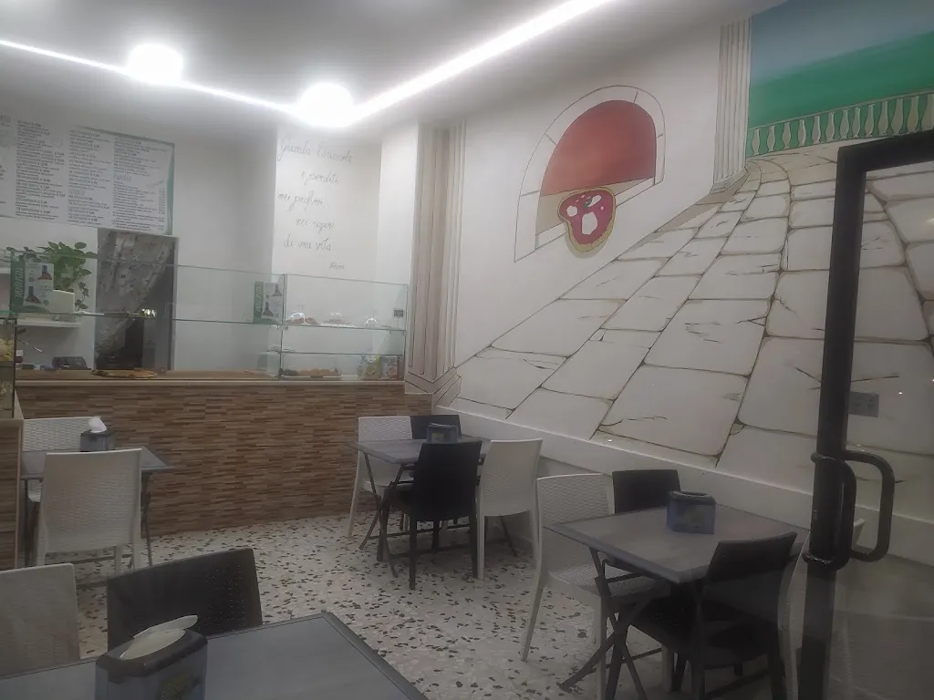 Pizzeria. Rosticceria Con Piatti tipici da Asporto E Polli Allo Spiedo. ROSTIPIZZA Frittura di pesce restaurant in Vico del Gargano