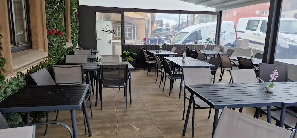 Café Pizzeria le millenaire restaurante en Oberfeulen