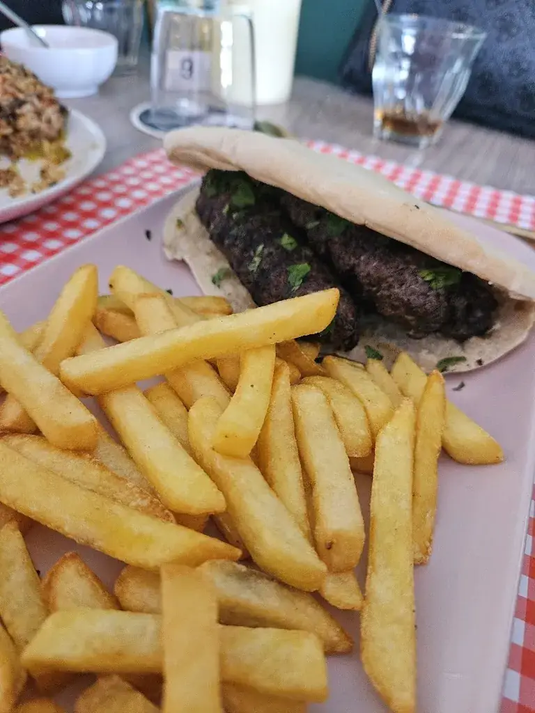 S Defoer_Titos_Bussum_review