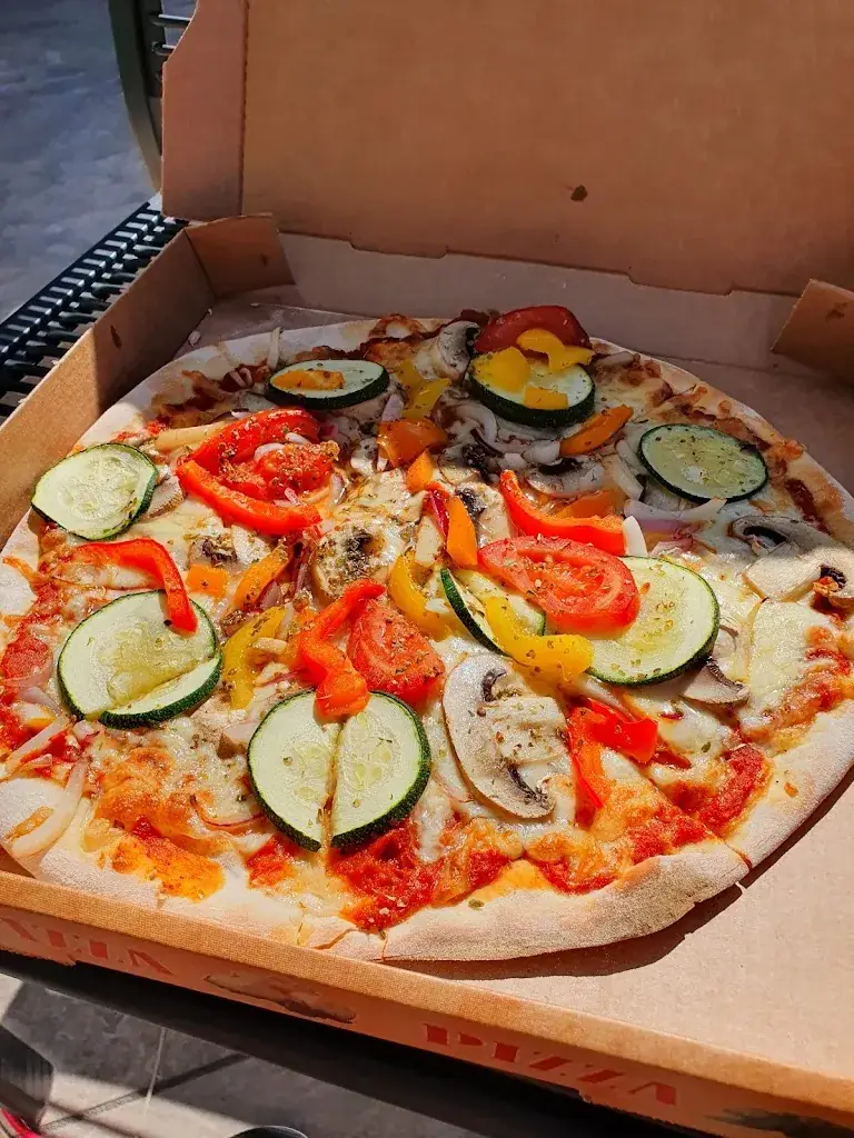 Menu_De Golf | Pizza, döner en flammkuchen_Maartensvlotbrug_imagen_8