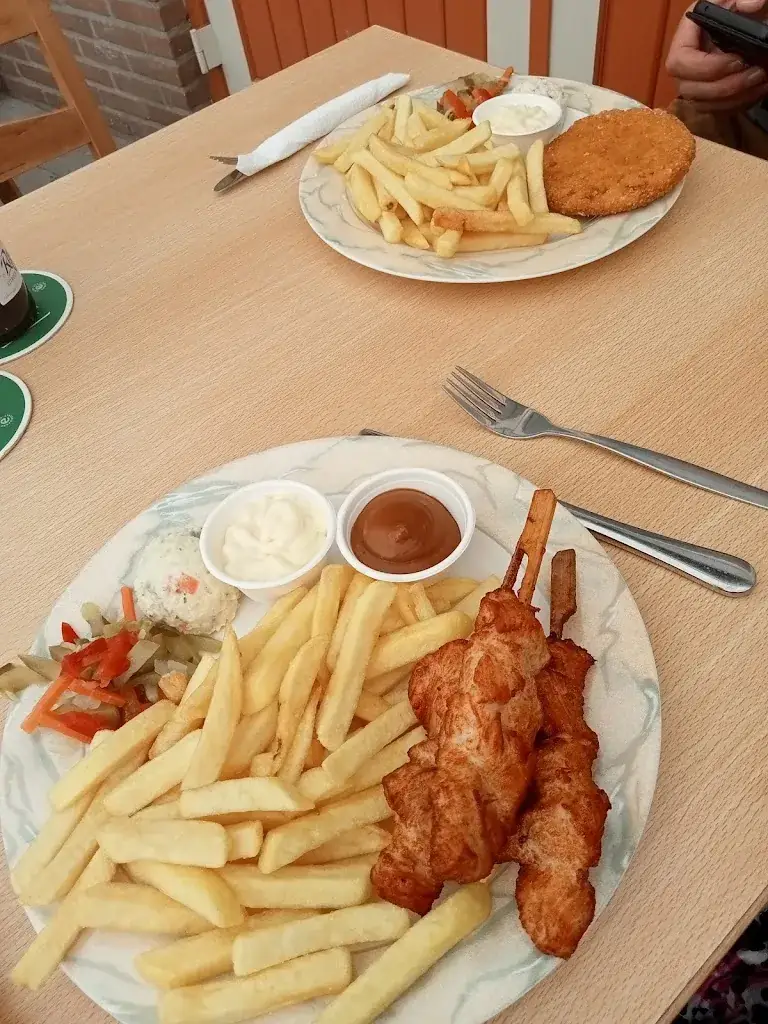 Annet De Lange Jutstra_Café Oranjestein_Oranje_recensione