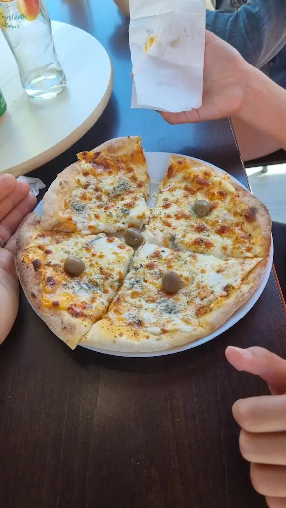 David G._Xavier lá Pizzaria_Cótimos_review