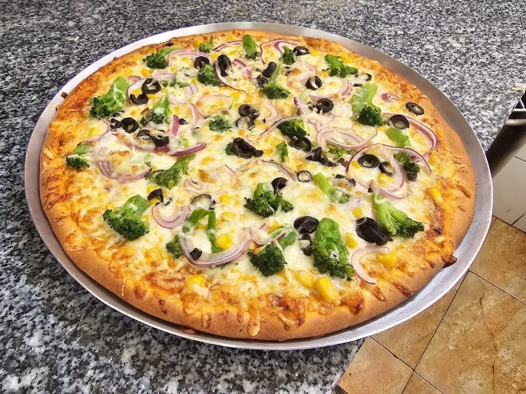 Deepak Sharma_Tasty Bites Pizza & Kebab_Lourosa_review