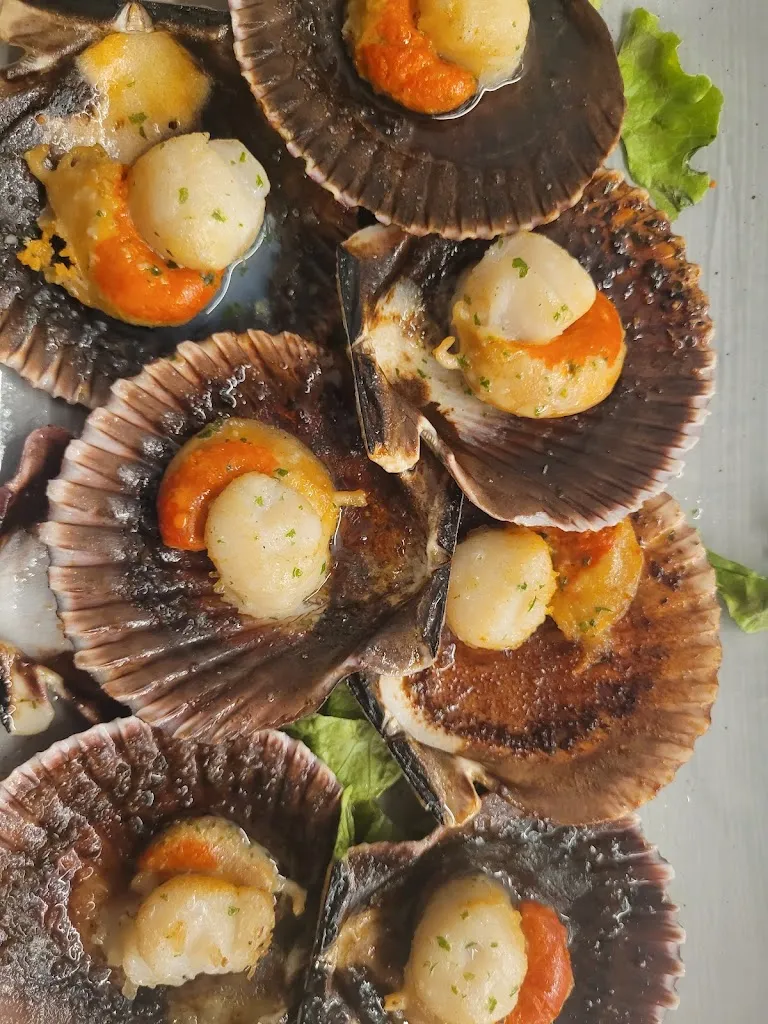 Jason and Melanie Walsh_Parrillada 107 cervecería_Arzúa_recensione