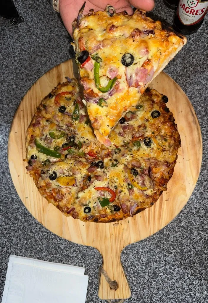 Surender Singh_Taj café restaurante_Santa Comba_review