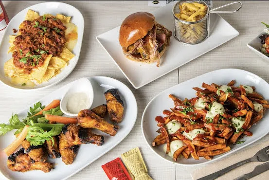 Madhattan - Restaurante de comida americana en Madrid_Trazo_slider_image_3