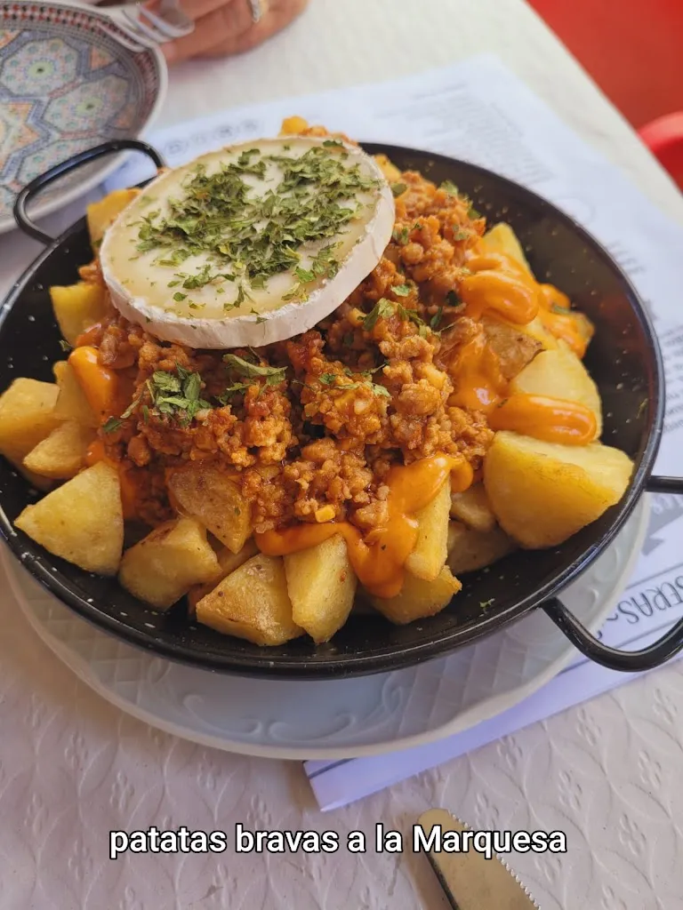 Ausilia Rossi_Restaurante Hucho's café&bar_Guadalcázar_review