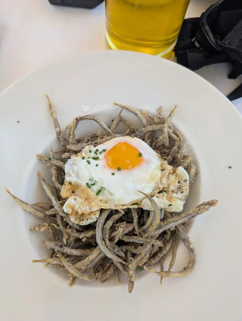 Neil Davis_Restaurant Arnau Can Perot_Sant Martí de Llémena_avis