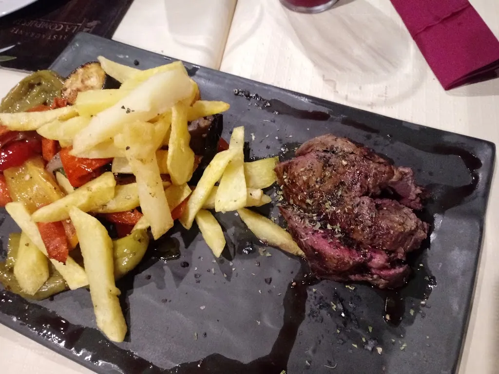 Ki H. LEE_Restaurante Asador La Compuerta_Pinos Genil_recensione