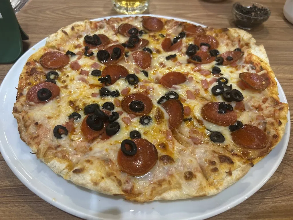 Juan Flores_Pizzería Río Rosso - San Juan del Puerto_San Juan del Puerto_review