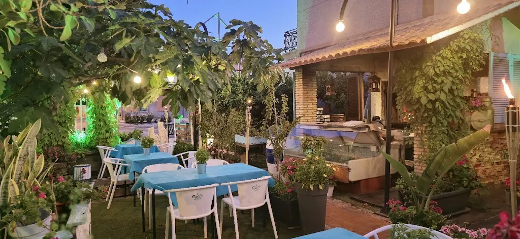 El Ruedo Asador & Jardín.Brasas De Leña_Lumbreras_slider_image_1