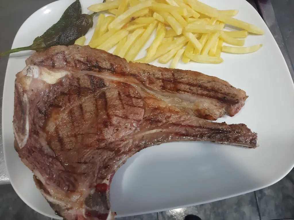 Ca la Carme,Bar de tapes,paella,peix i marisc,carn a la brasa i caracols_Tàrrega_slider_image_3